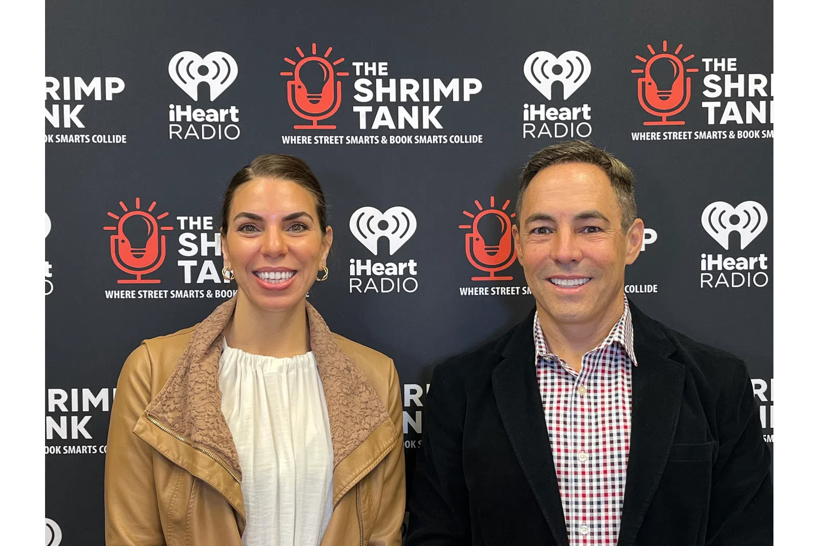 a man and a woman smiling