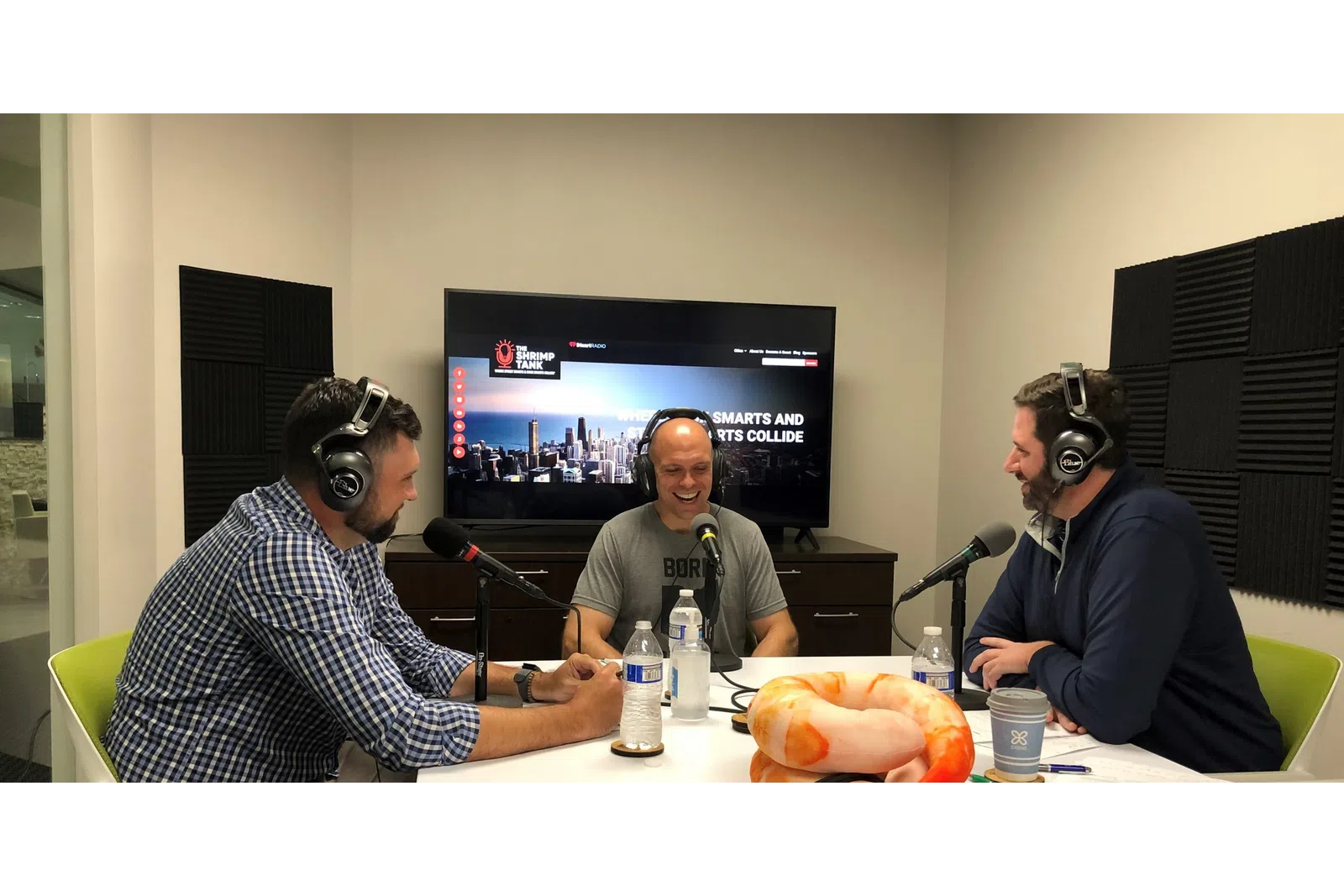 a group of men wearing headphones