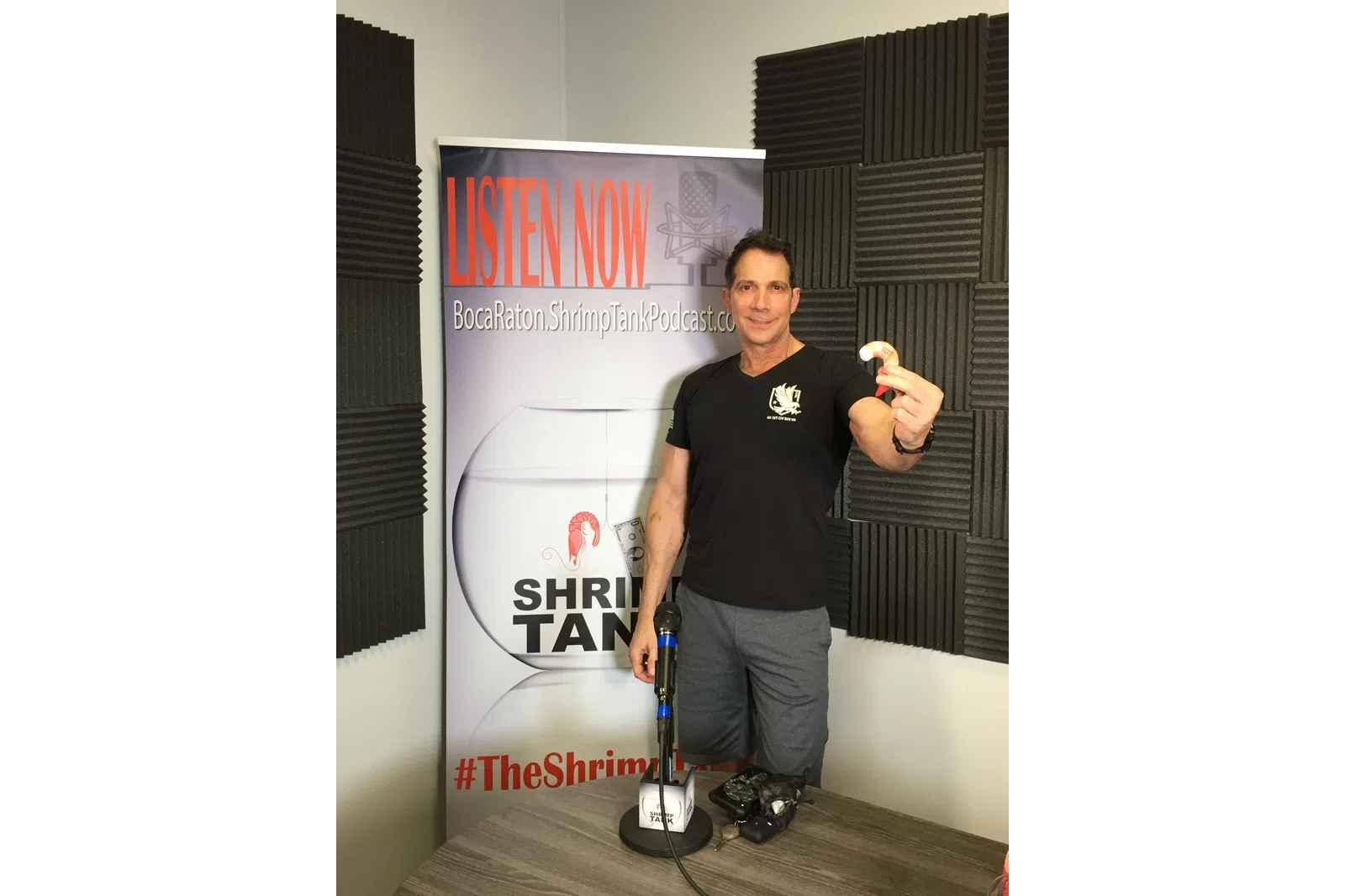 a person holding a skateboard