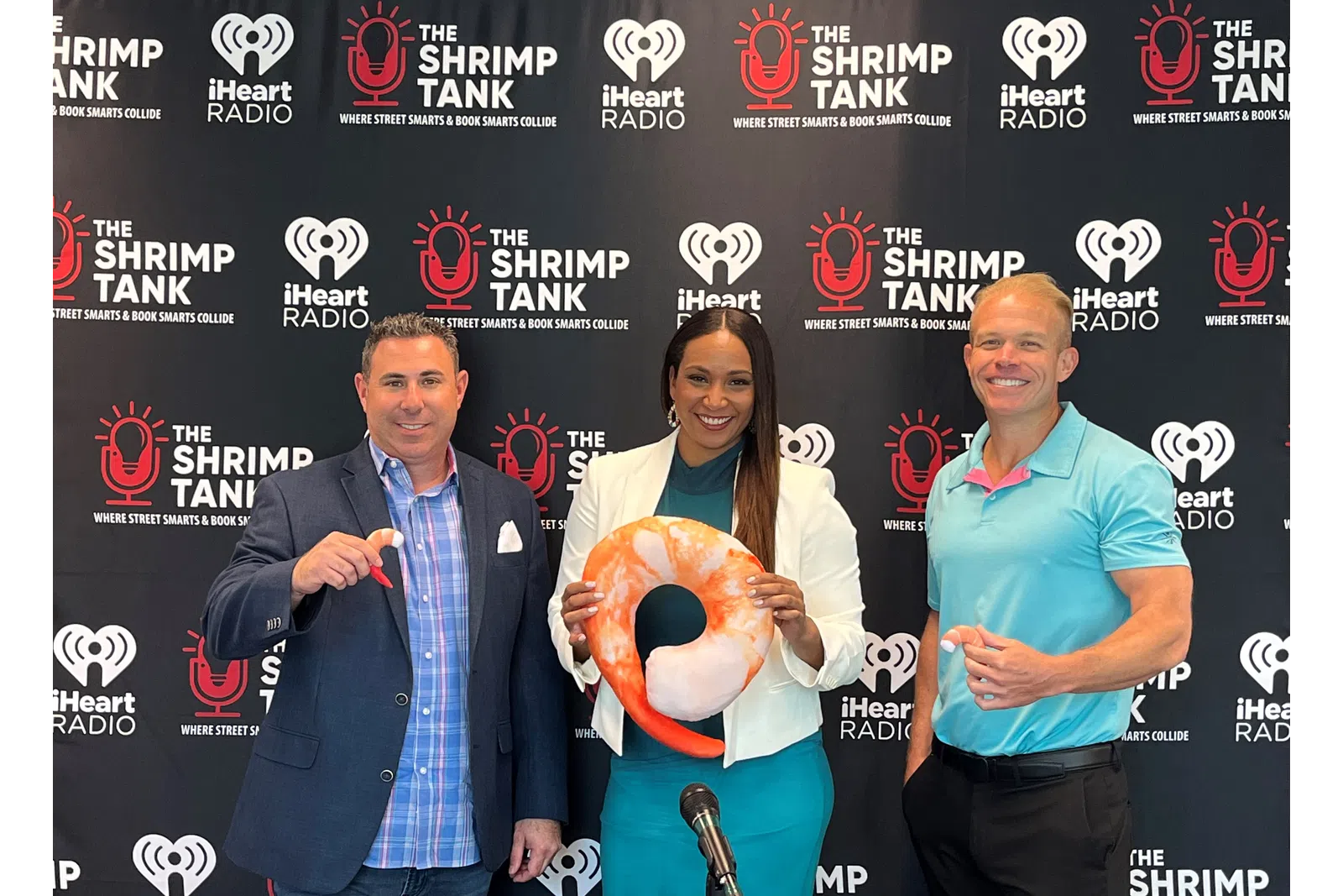 Tamika Bickham et al. holding a giant donut