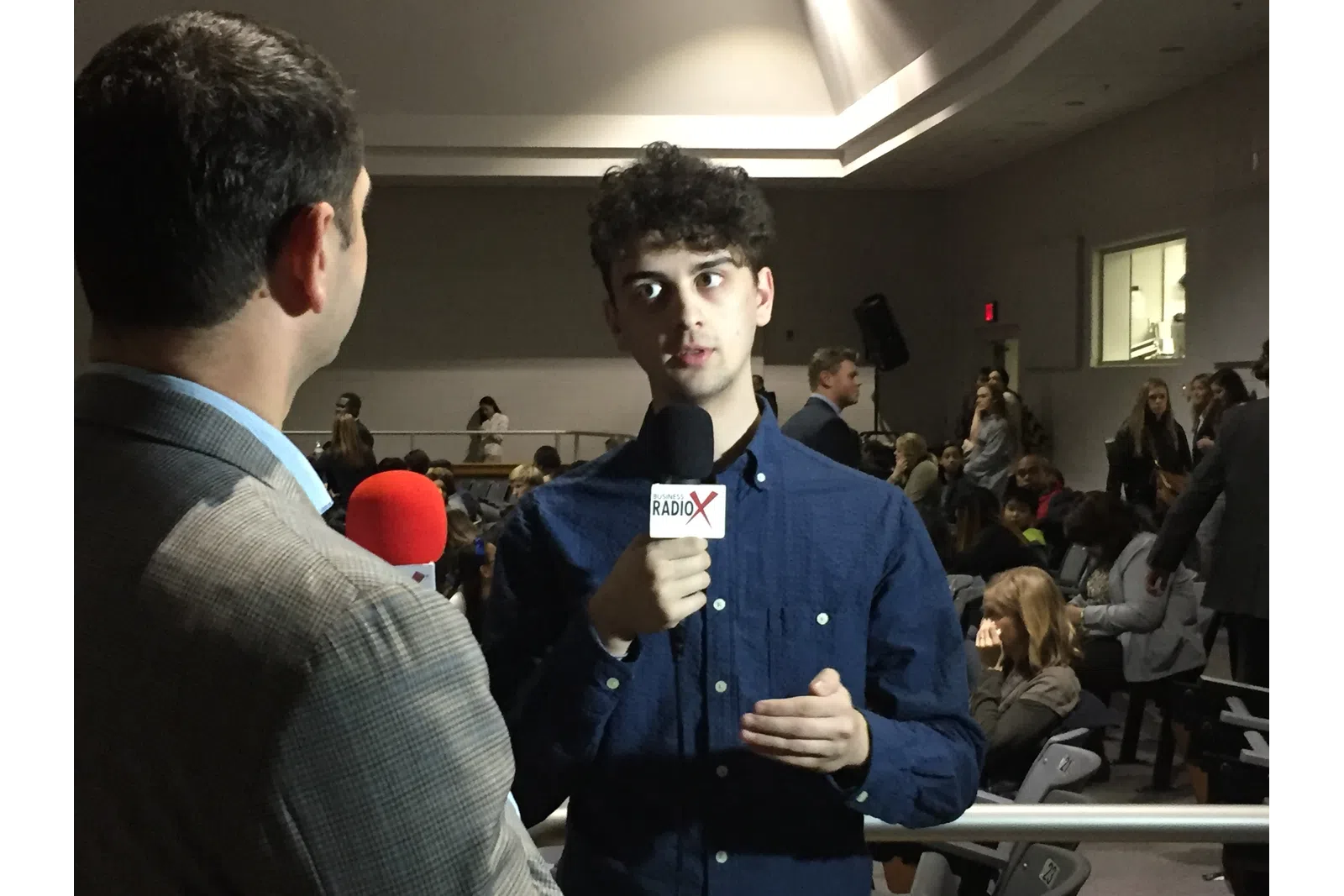 a man holding a microphone