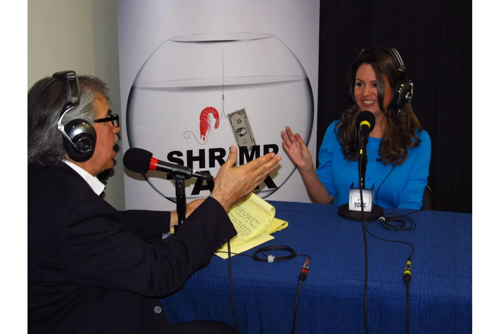 a man and woman wearing headsets