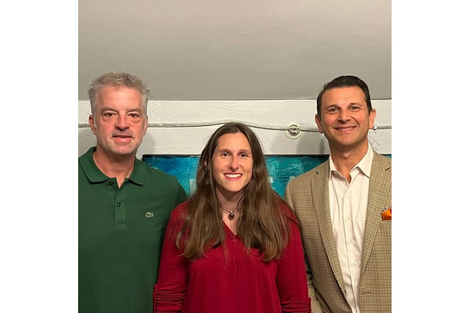 Greg Abel, Cammi Granato et al. posing for a photo