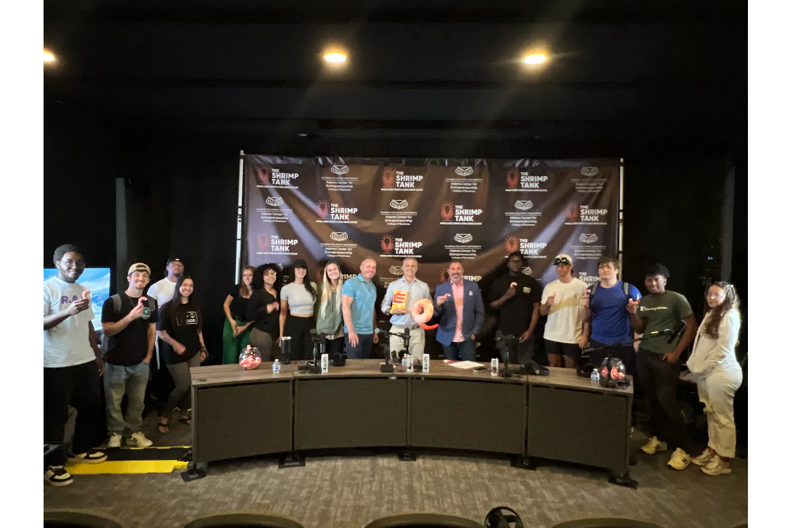 a group of people standing on a stage