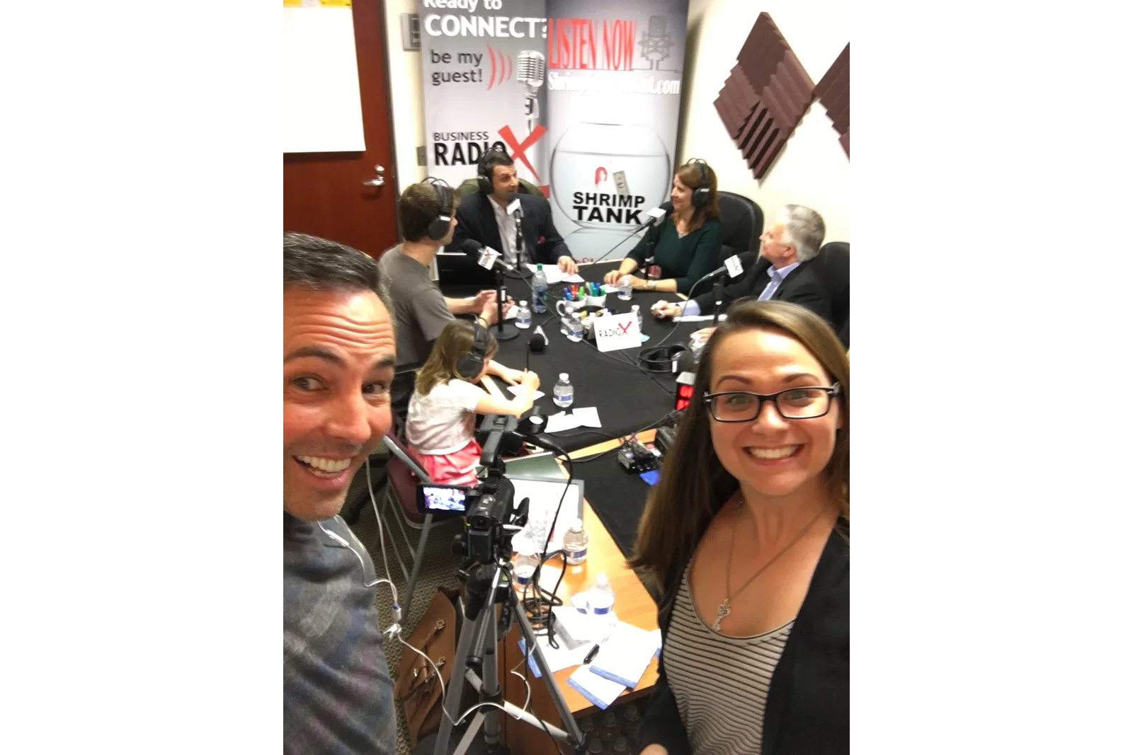 a group of people sitting at a table
