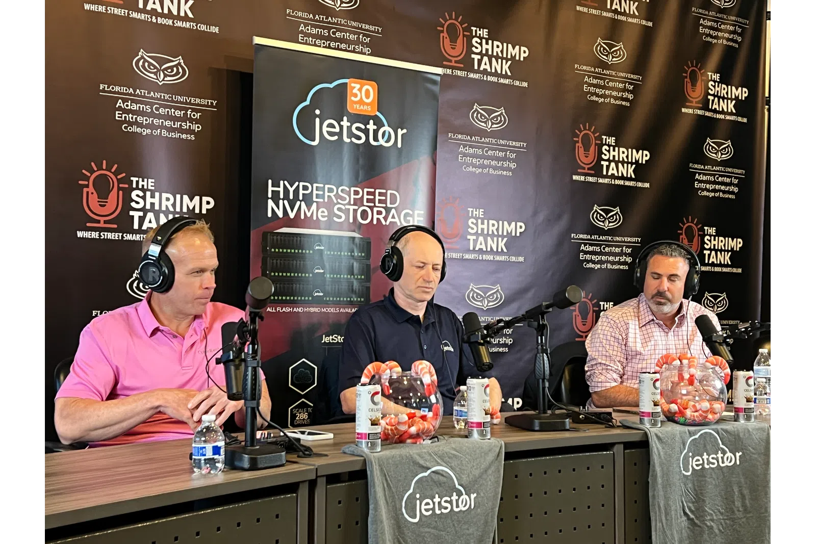 Panel discussion featuring three experts at the Shrimp Tank, highlighting Jetstor's NVMe storage solutions.