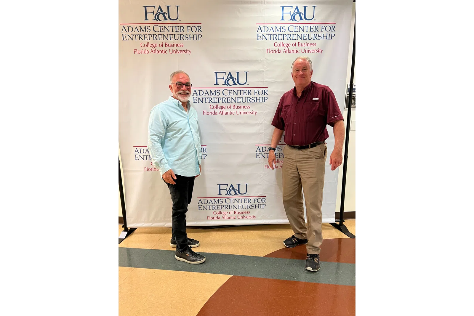 a couple of men posing for a picture
