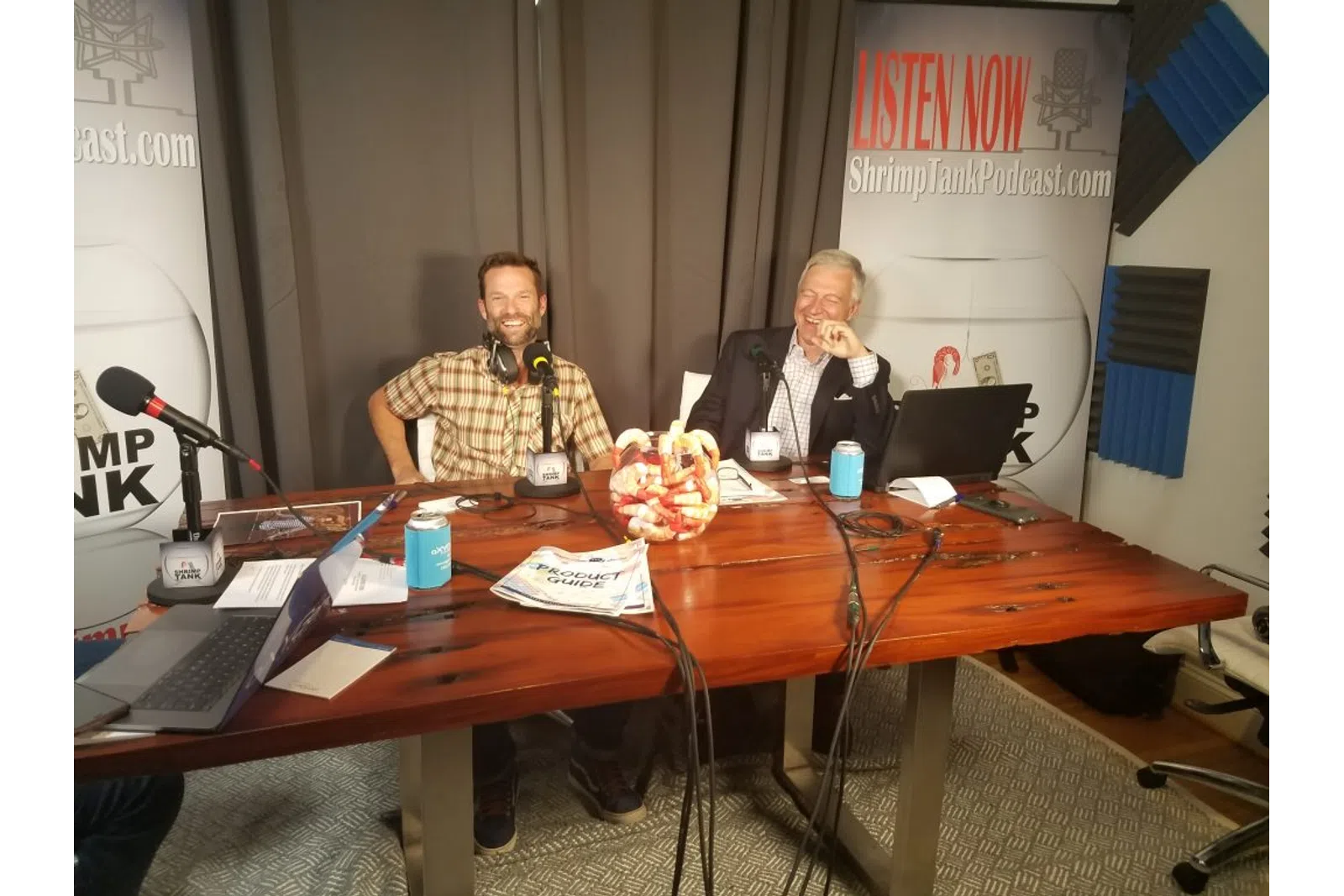 a few men sitting at a table
