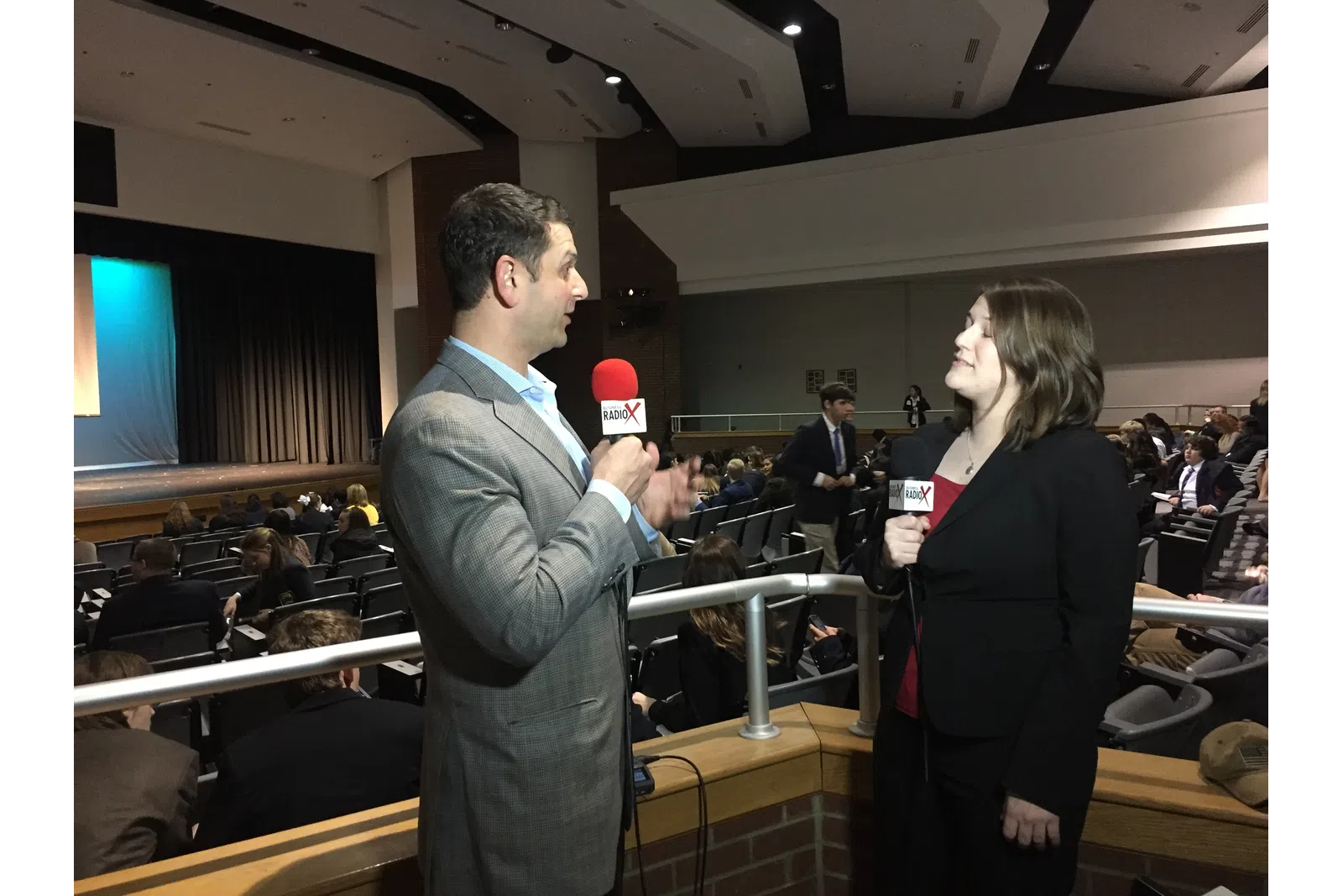 a man and a woman talking