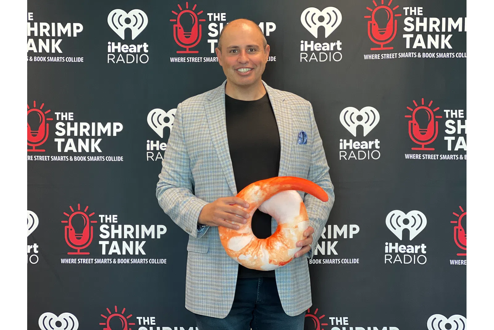 Corey Saban holding a large snake
