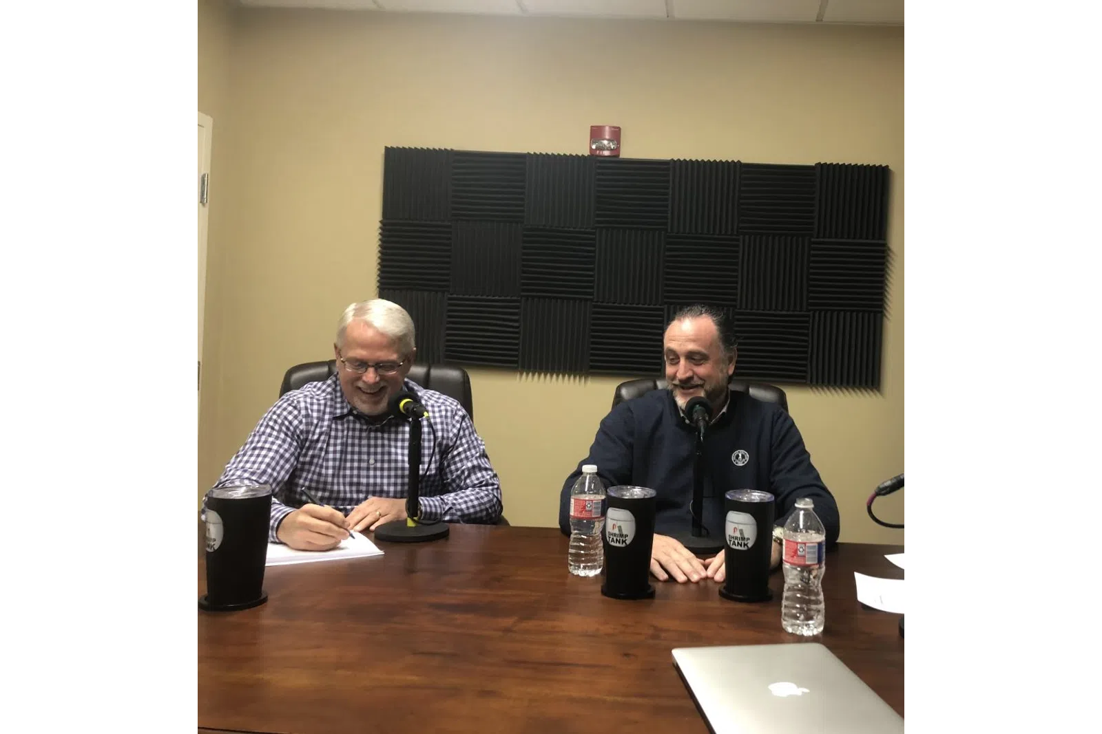 men sitting at a table