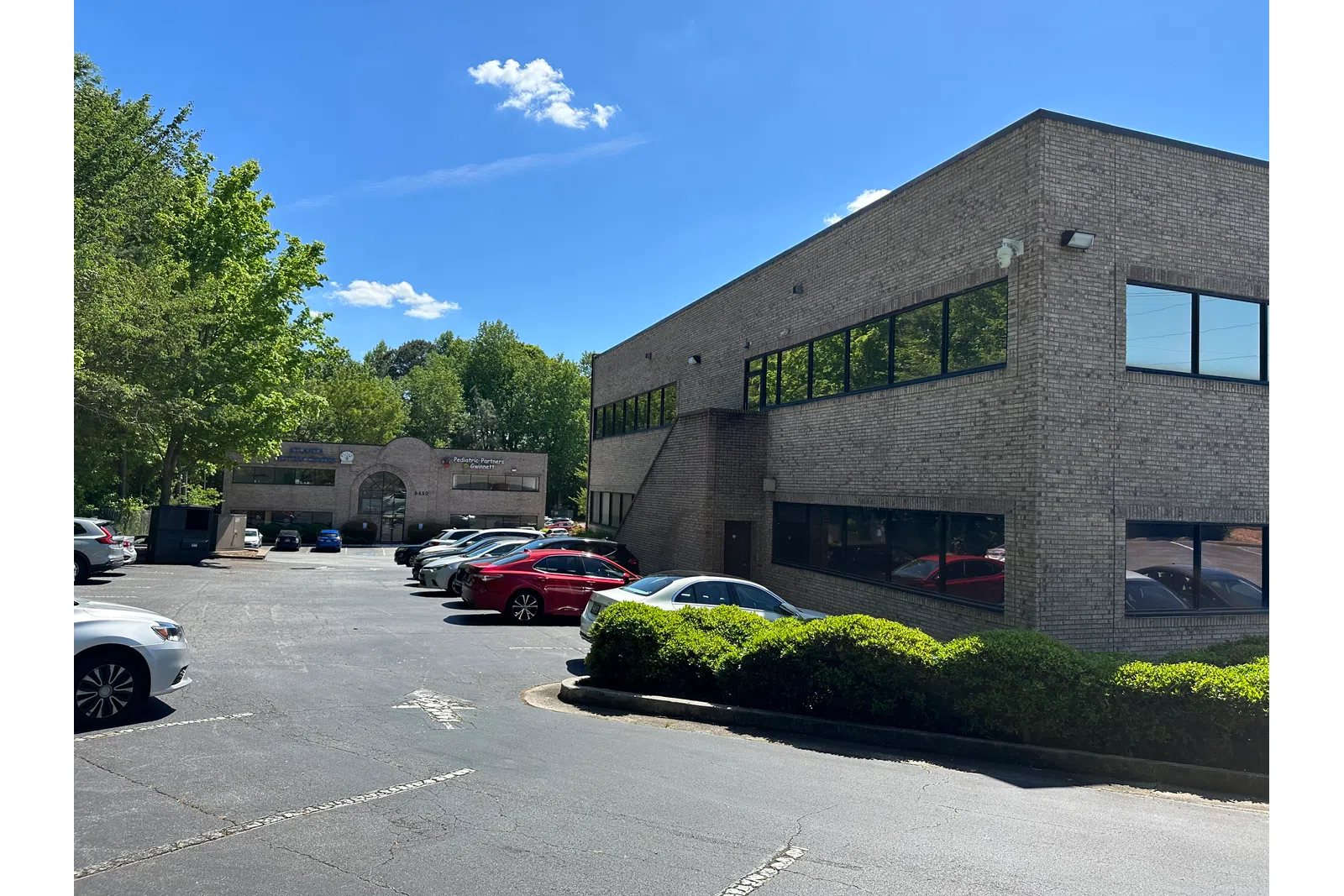 a building with cars parked outside