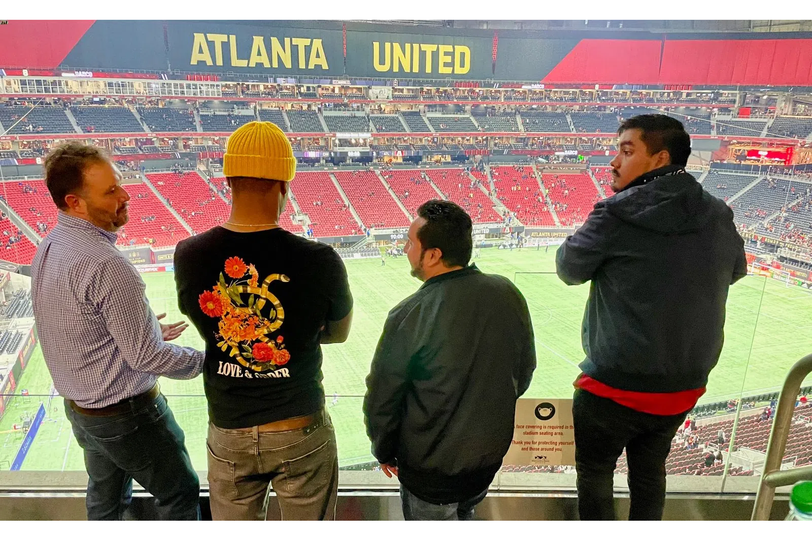 a group of people standing in a room