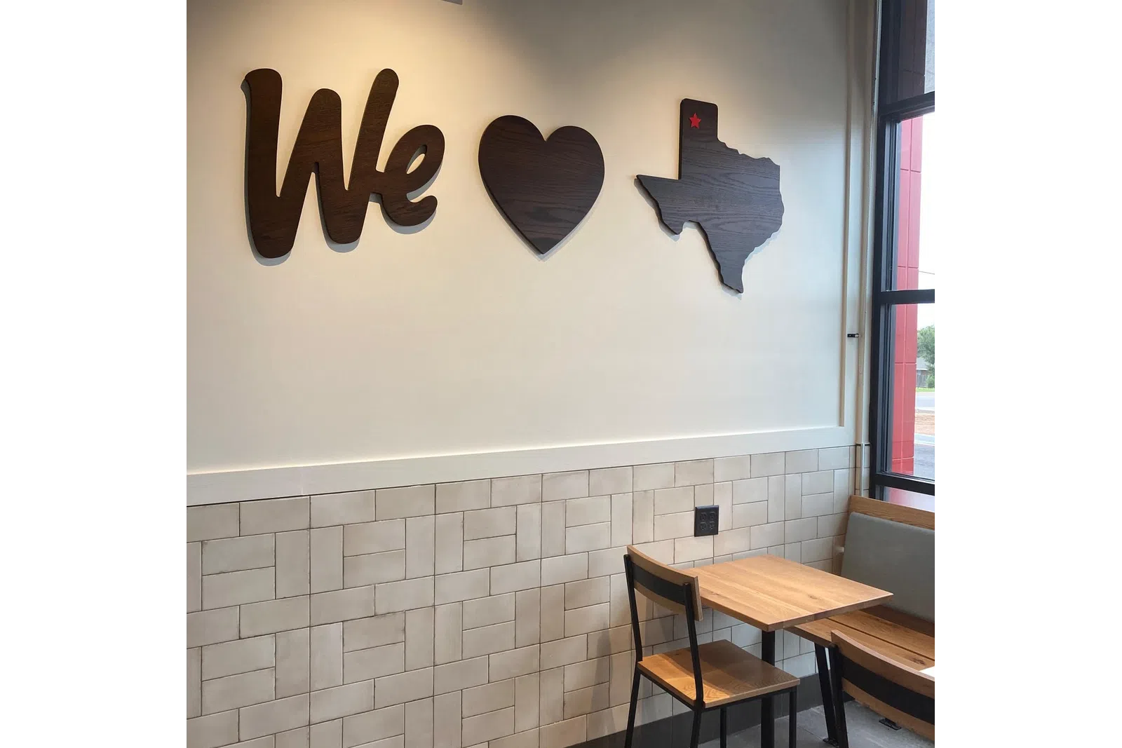 a wall with a sign on it
