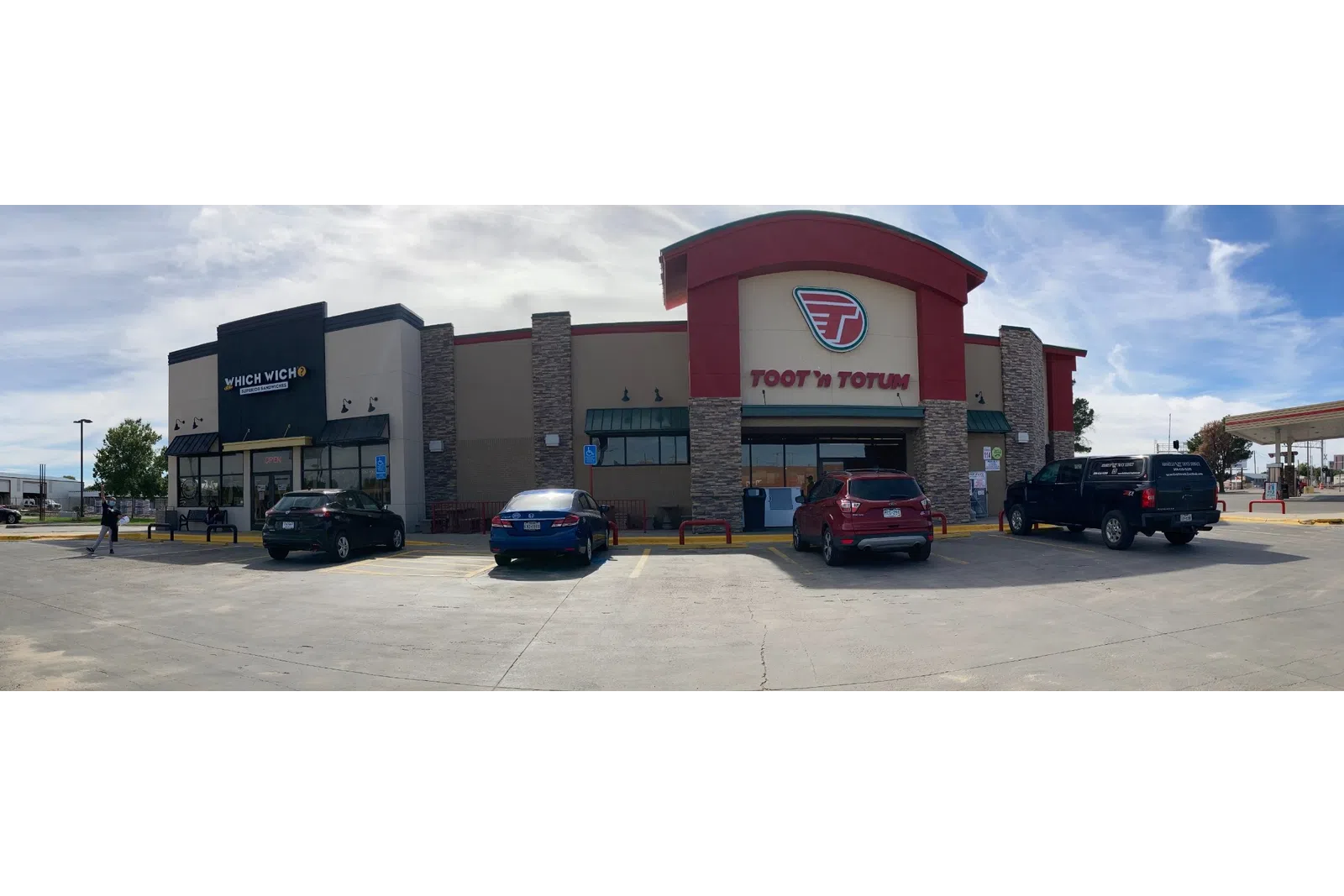 a group of cars parked outside a building