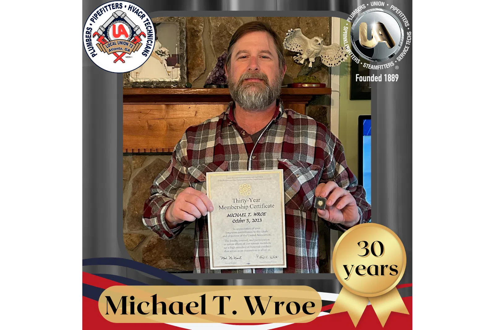 a man holding a certificate