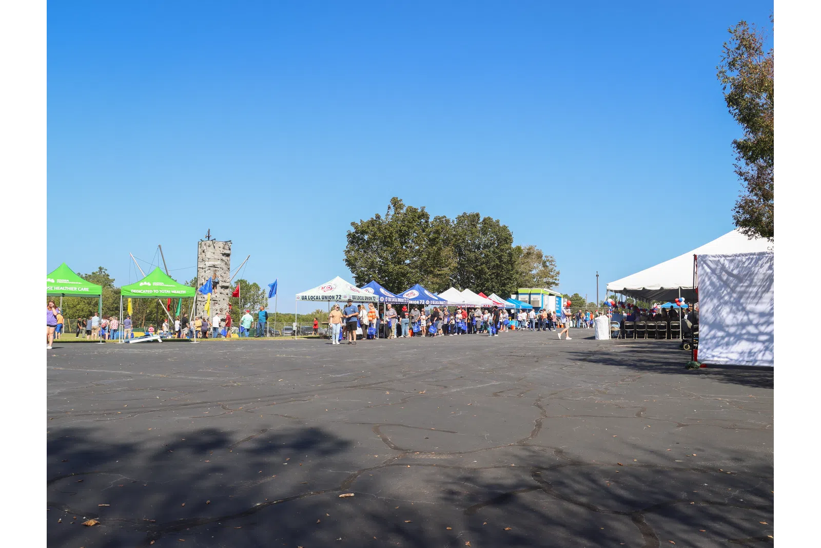 a crowd of people at an outdoor event