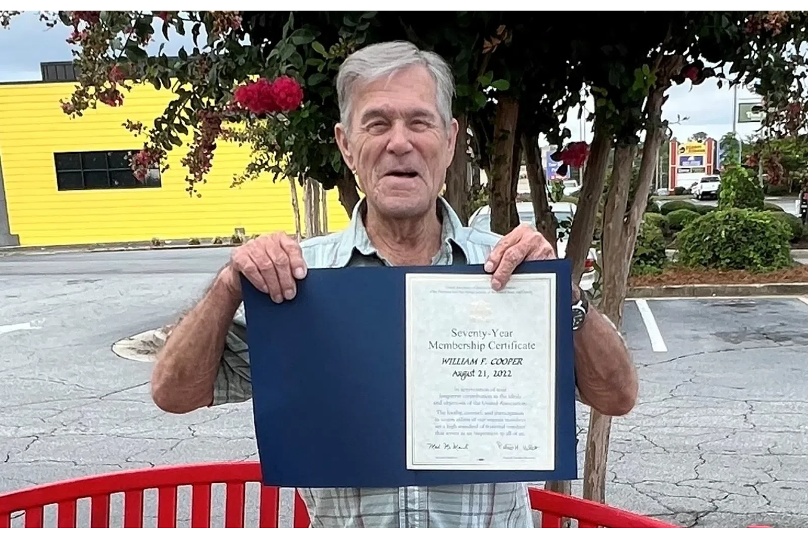 a person holding a sign