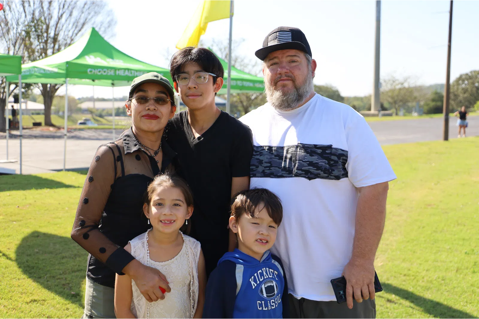 a group of people posing for a photo