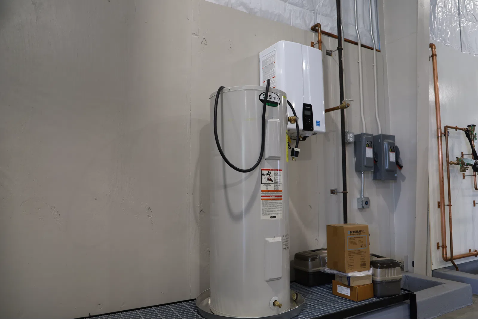 a white machine with a wire attached