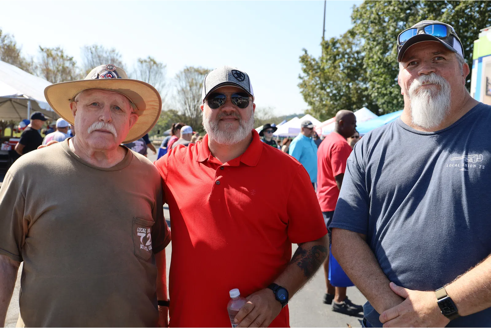 a group of men wearing hats