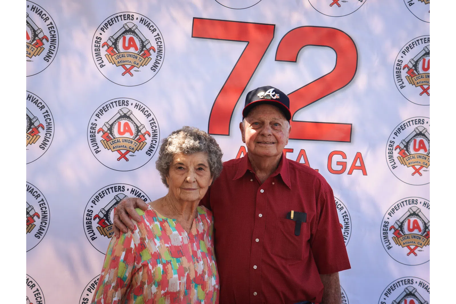 a man and woman posing for a picture