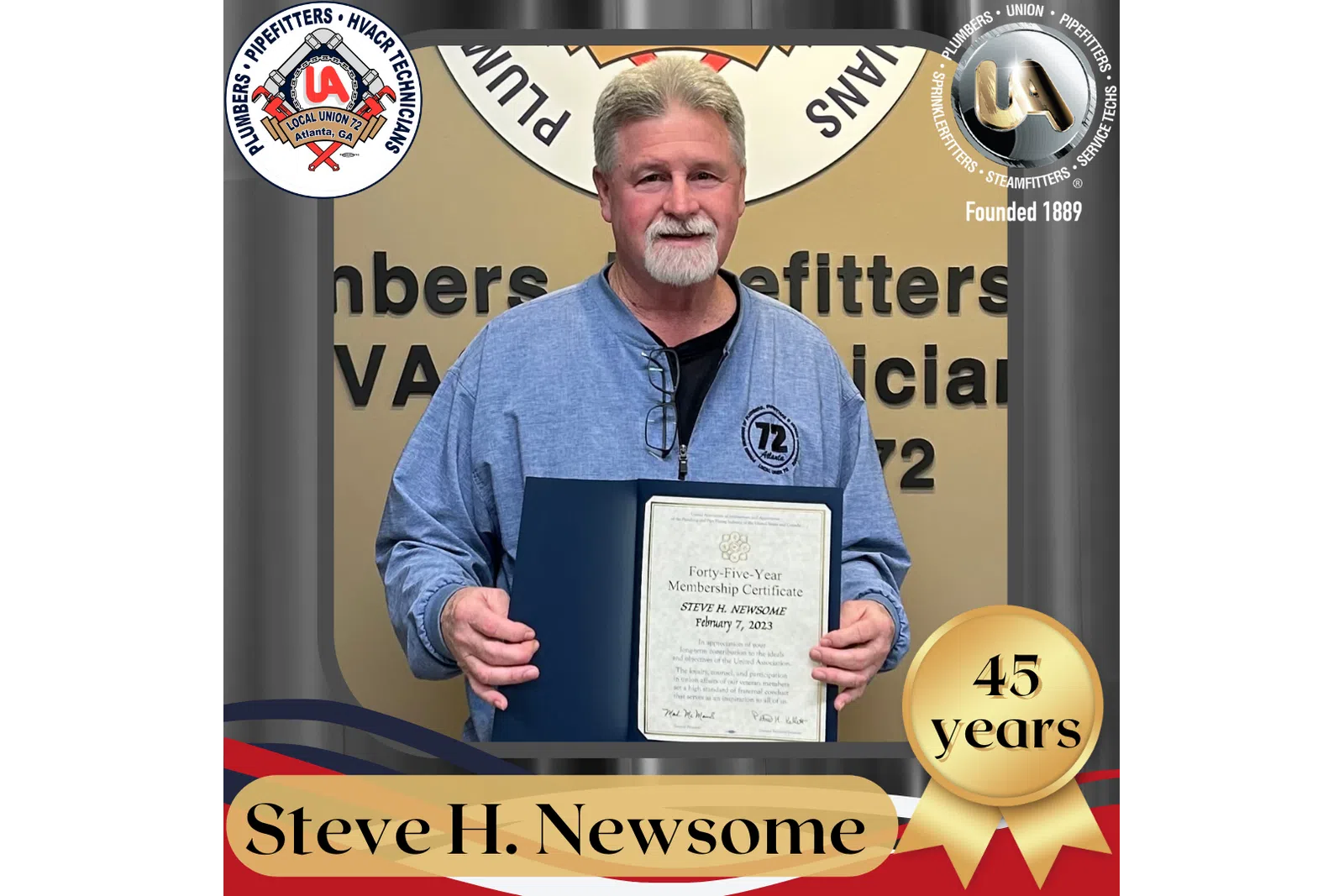 a man holding a certificate