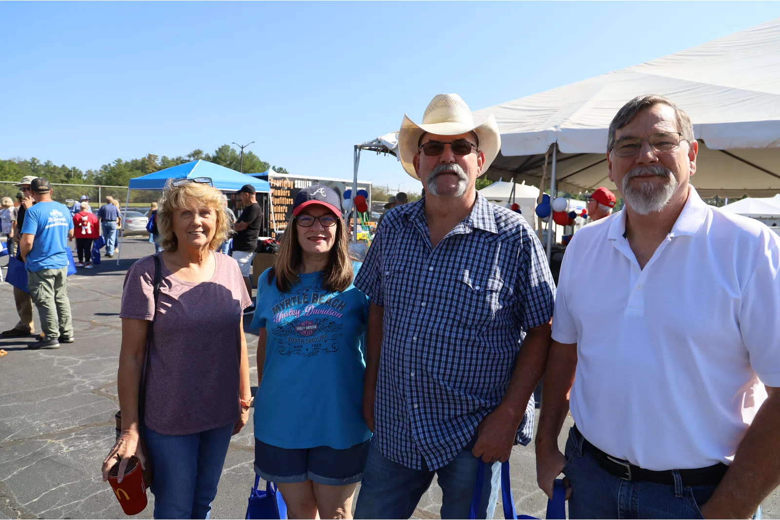 a group of people posing for a photo