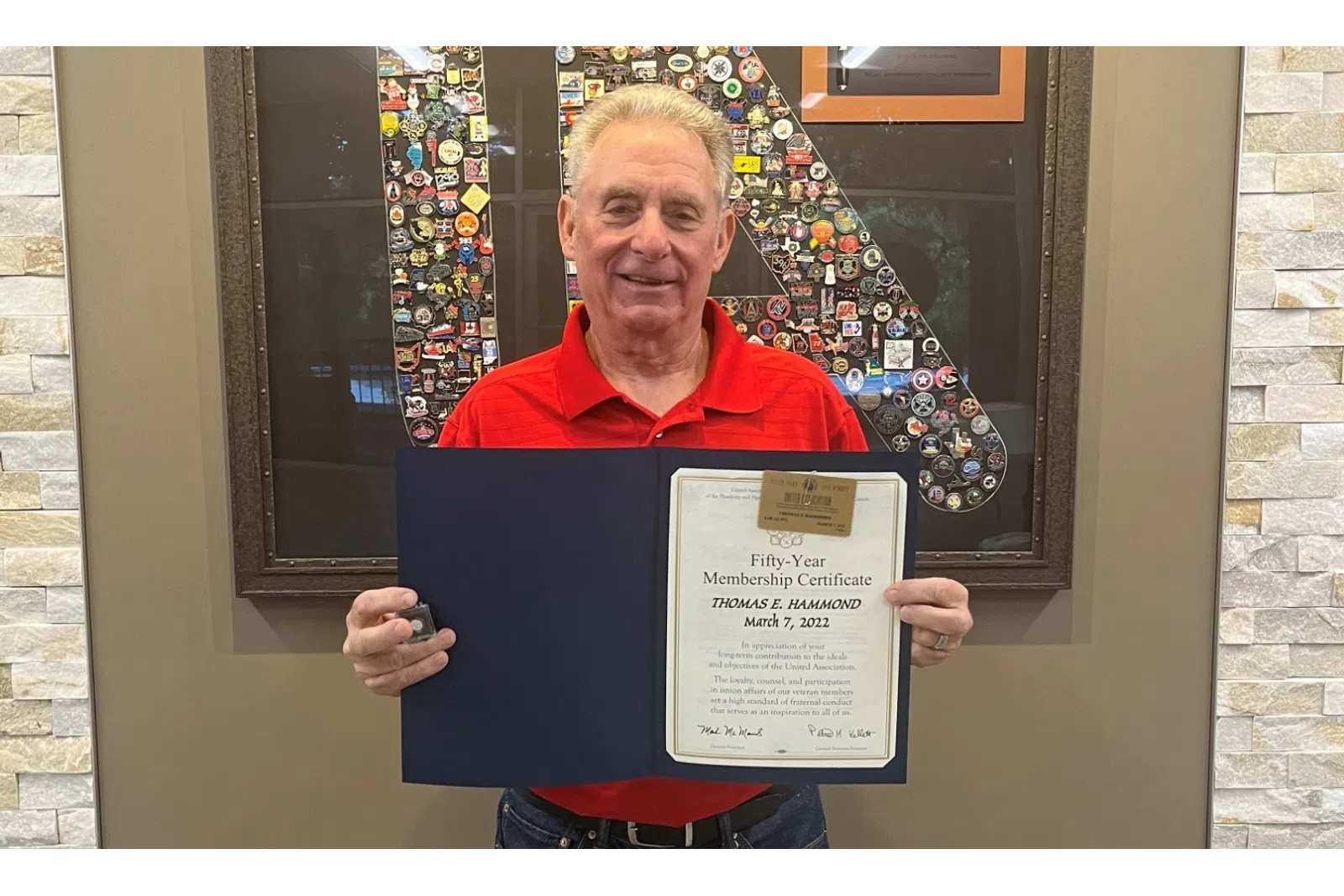 a person holding a certificate