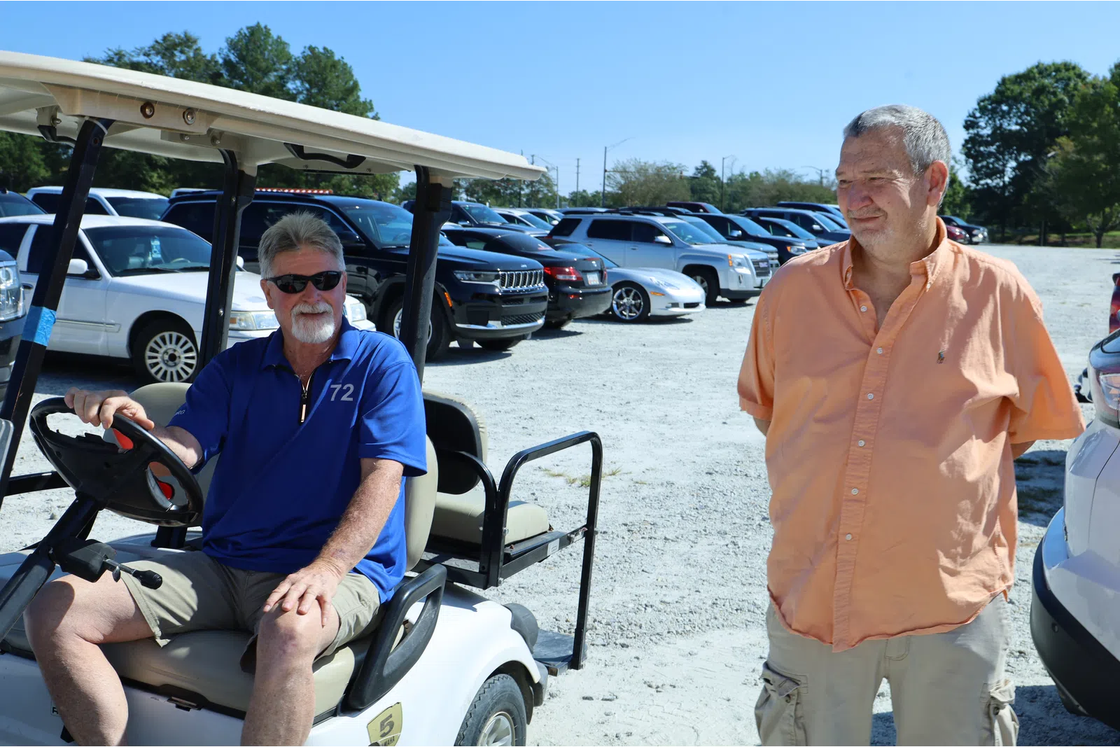 a man in a wheelchair next to a man in a wheelchair