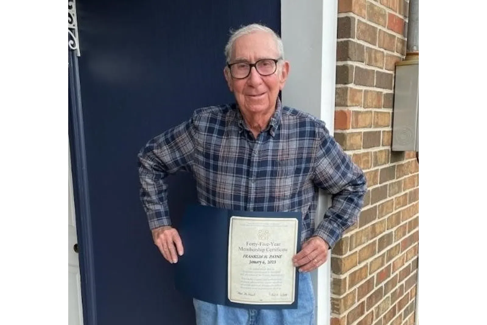 a man holding a sign
