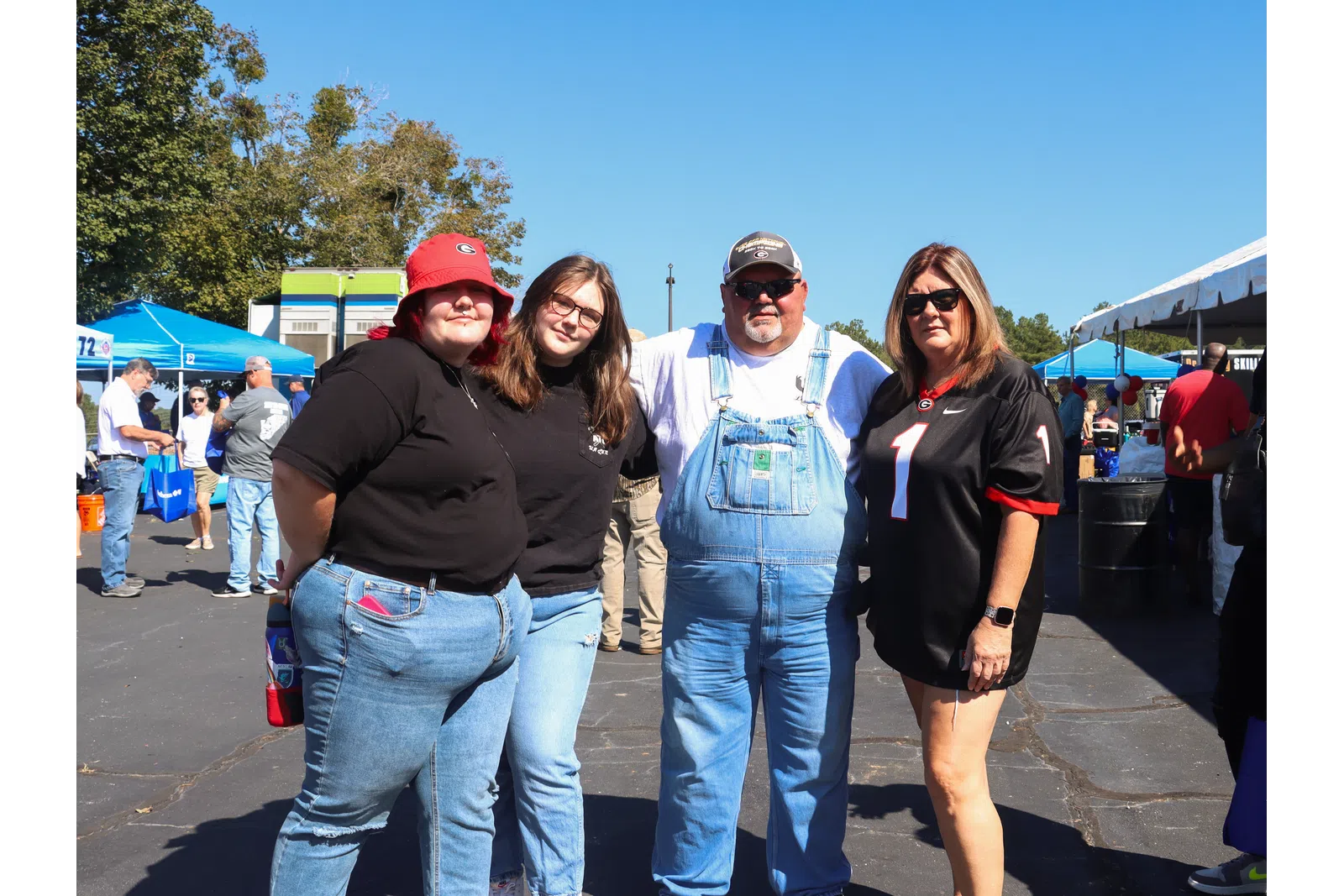 a group of people posing for a photo