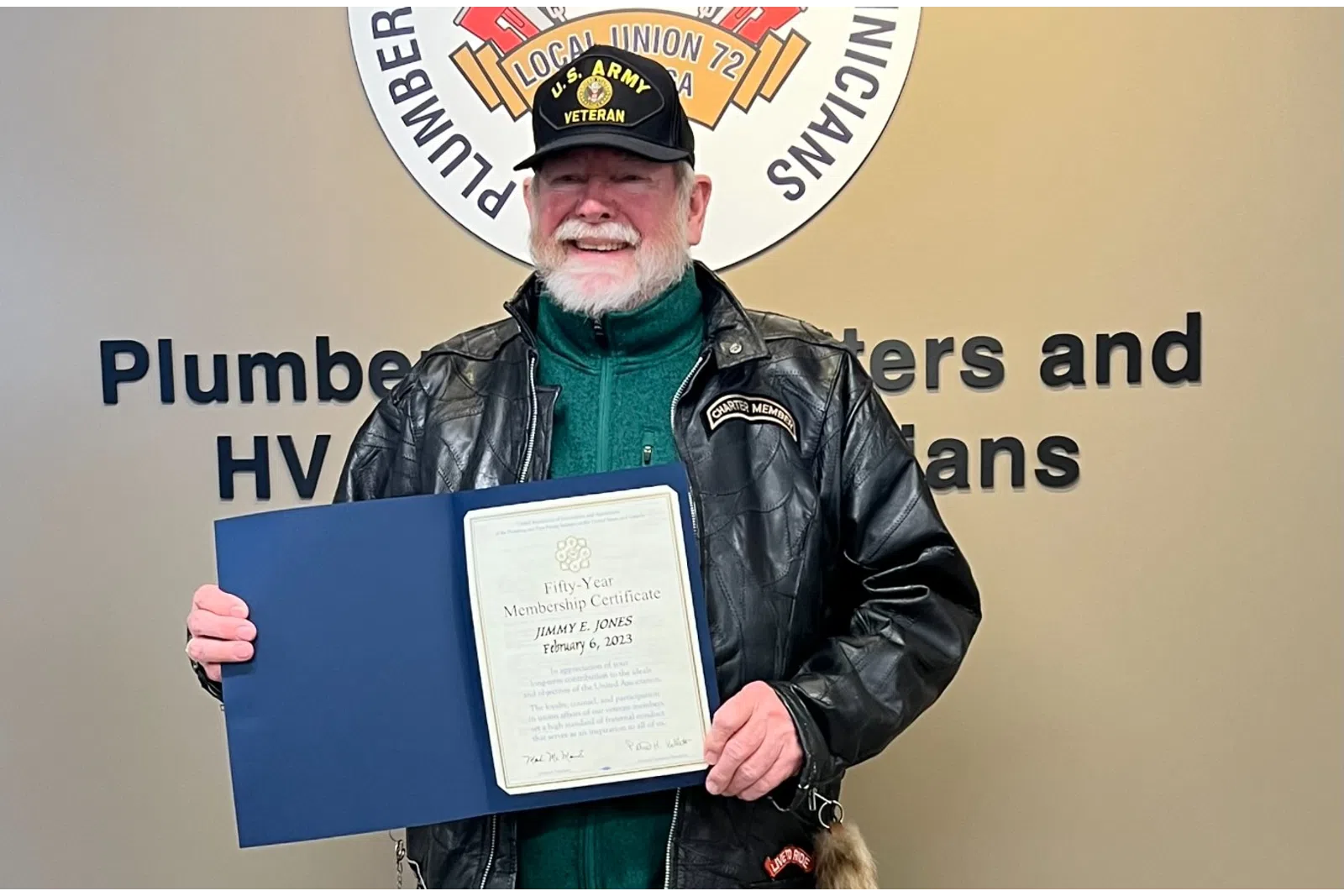 a person holding a certificate