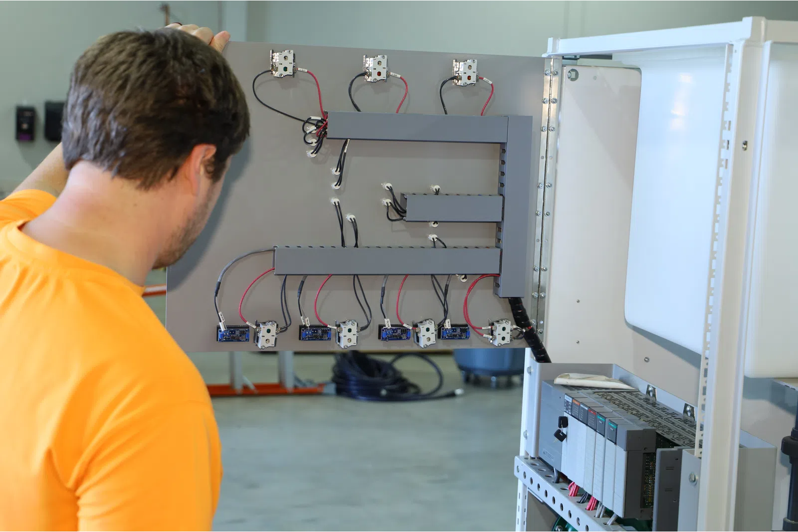 a man looking at a machine