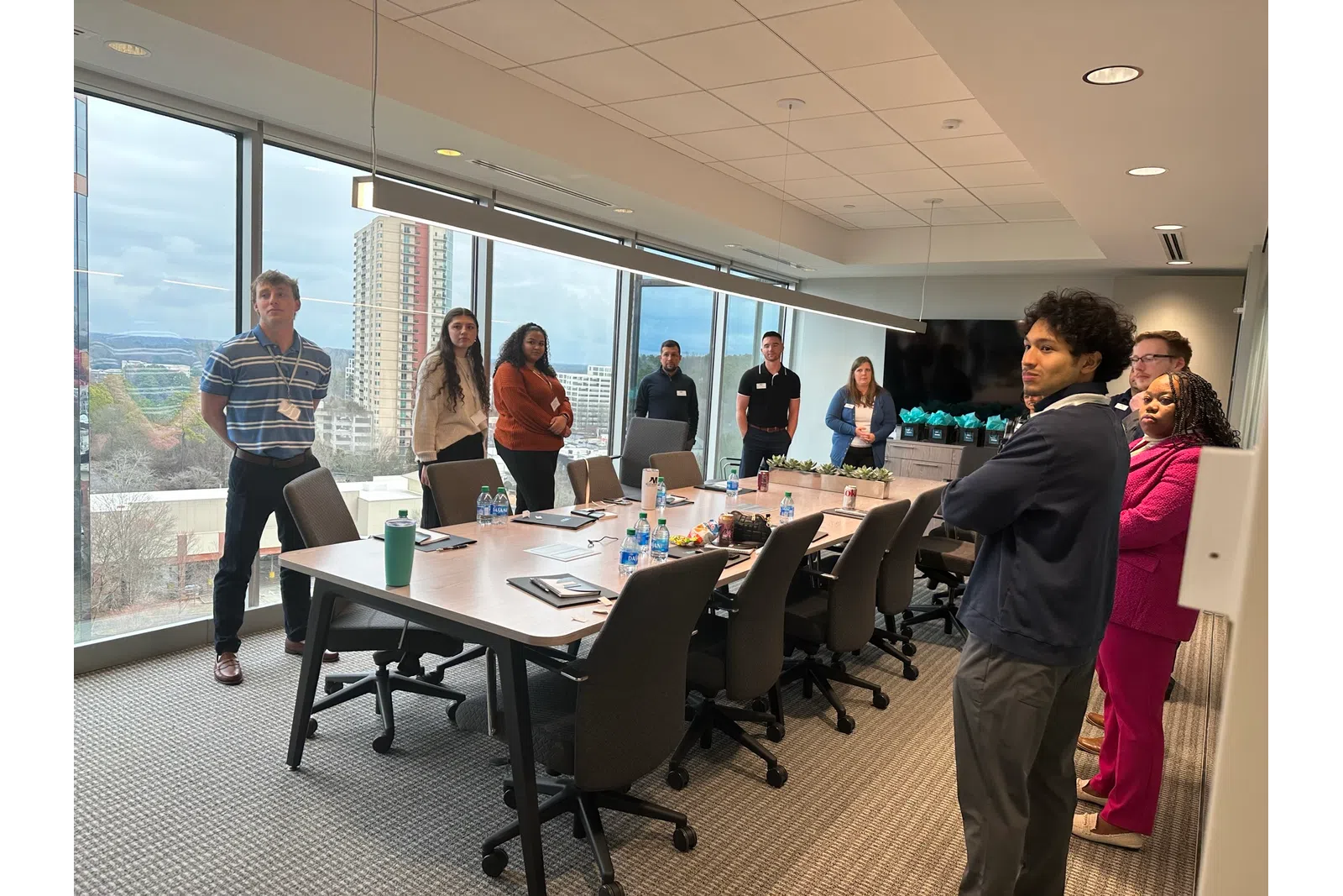 a group of people in a meeting