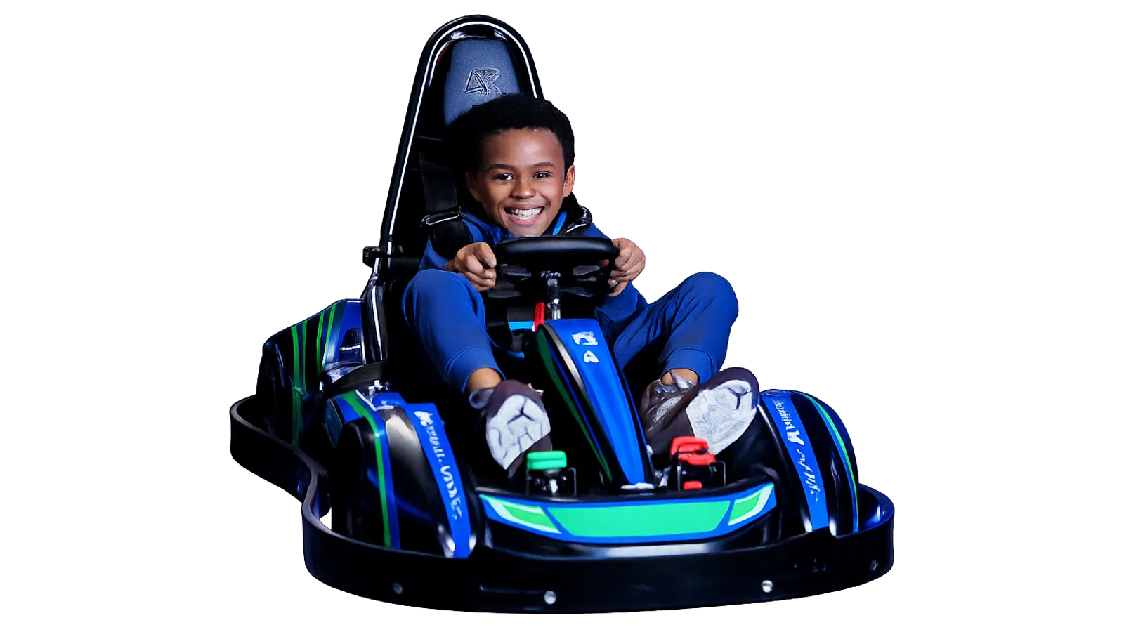 Smiling boy in blue outfit driving a blue and green go-kart with a racing seat and steering wheel.