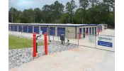 a construction site with a blue fence