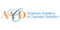Logo of the American Academy of Cosmetic Dentistry with stylized A A C D letters in orange and blue.
