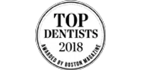 2018 Top Dentists award badge in a circular black and white design