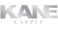 Shiny silver metallic logo of Kane Carpet with bold uppercase letters on black background.