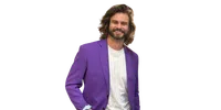 Smiling man with long hair wearing a purple blazer over a white t-shirt against a transparent background