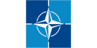 Blue and navy NATO compass star emblem divided into four quadrants with circular outline on white background