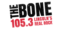 Red text logo for 105.3 Lincoln's Real Rock radio station on black background