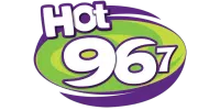 Hot 967 radio station logo with white text on green and purple oval background