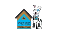 White dog with black spots wearing collar tag featuring Pyramid Contractors logo next to a house-shaped company logo