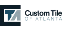 Logo of Custom Tile of Atlanta with a blue and gray stylized T and A