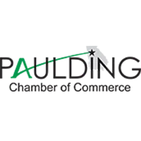 Logo of Paulding Chamber of Commerce featuring black and green text with a star and green swoosh design.
