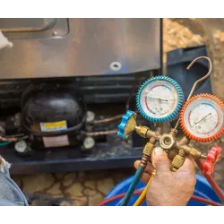 a person holding a device with wires