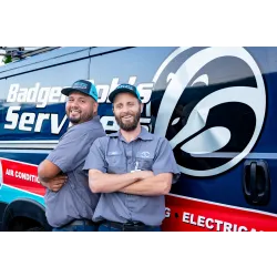 a man holding a laptop