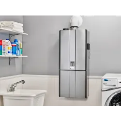 a refrigerator freezer sitting next to a sink